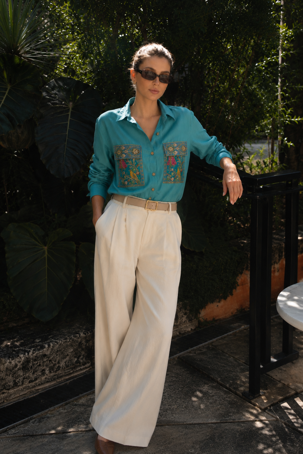 Model wearing the Noori embroidered turquoise shirt
