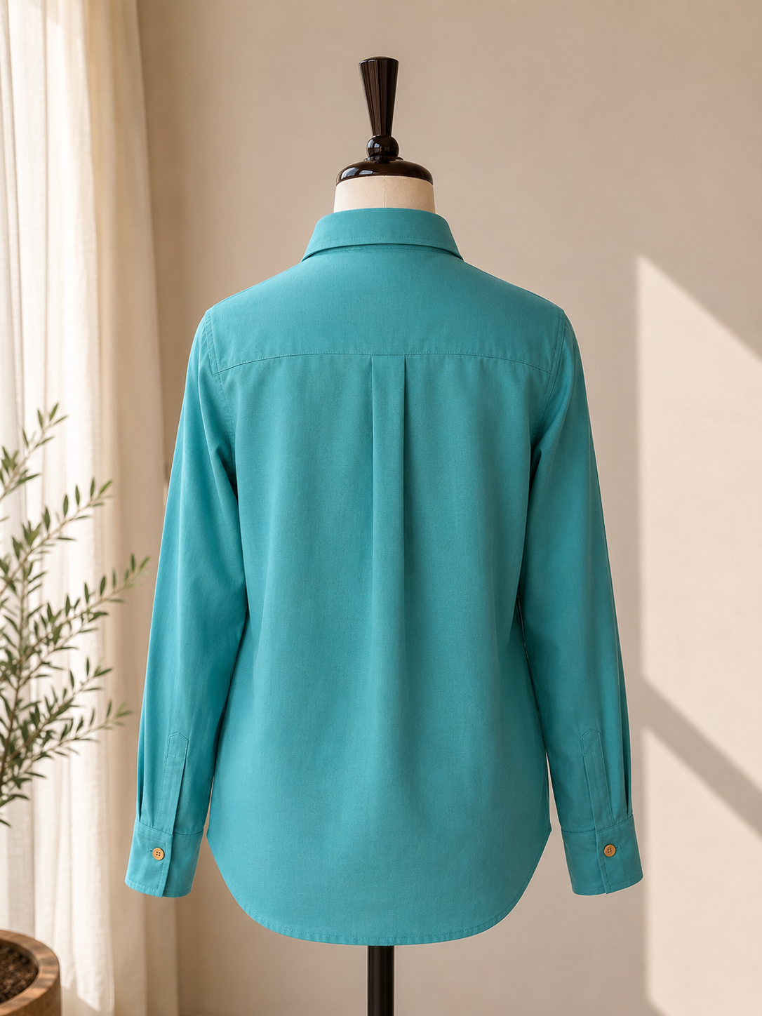 Back view of the Noori embroidered turquoise shirt